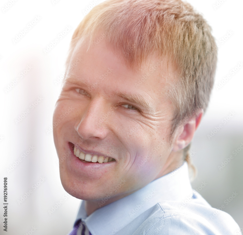 Confident businessman looking at camera, rear view Confident businessman looking at camera, rear view
