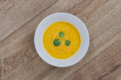 Carrot creme soup on a table
