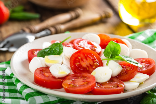 Tomato salad with mozzarella cheese and olive oil
