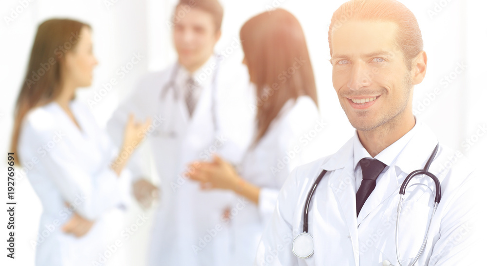 smiling doctor therapist on blurred background. smiling doctor therapist on blurred background.