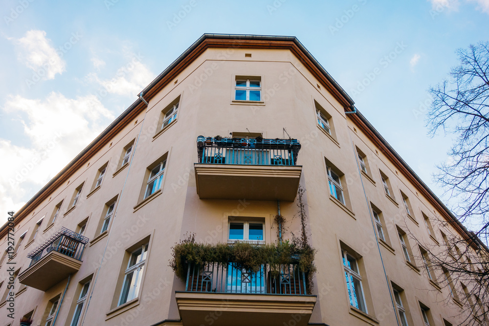 typical corner building in berlin from the low angle view