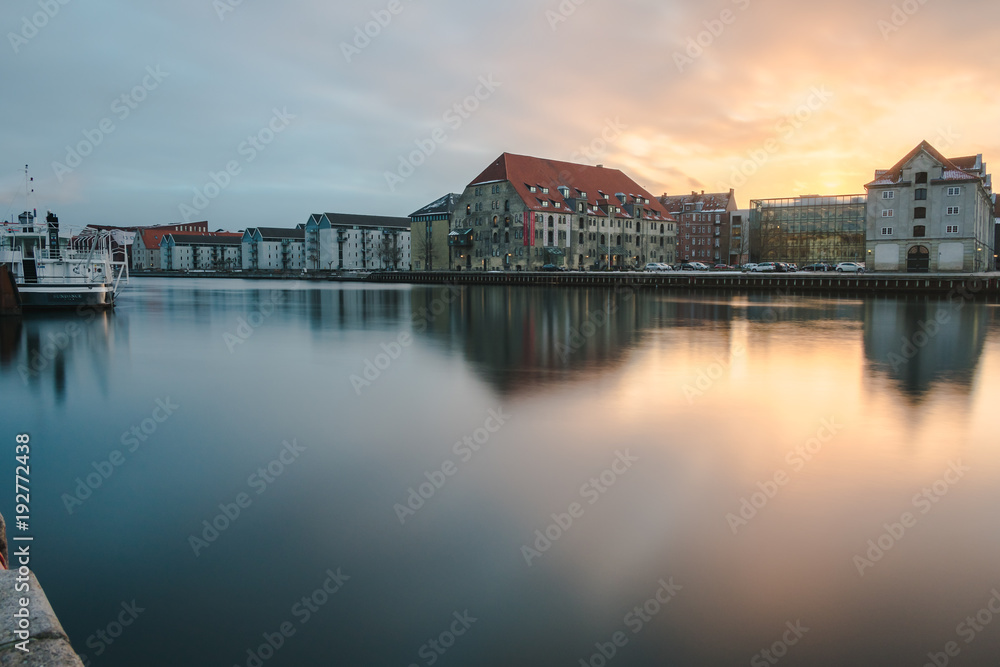 long exposure shot after sunrise in the center of copenhagen on the canal Nyhavn