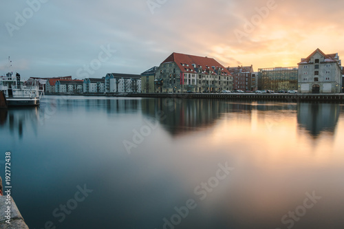 long exposure shot after sunrise in the center of copenhagen on the canal Nyhavn