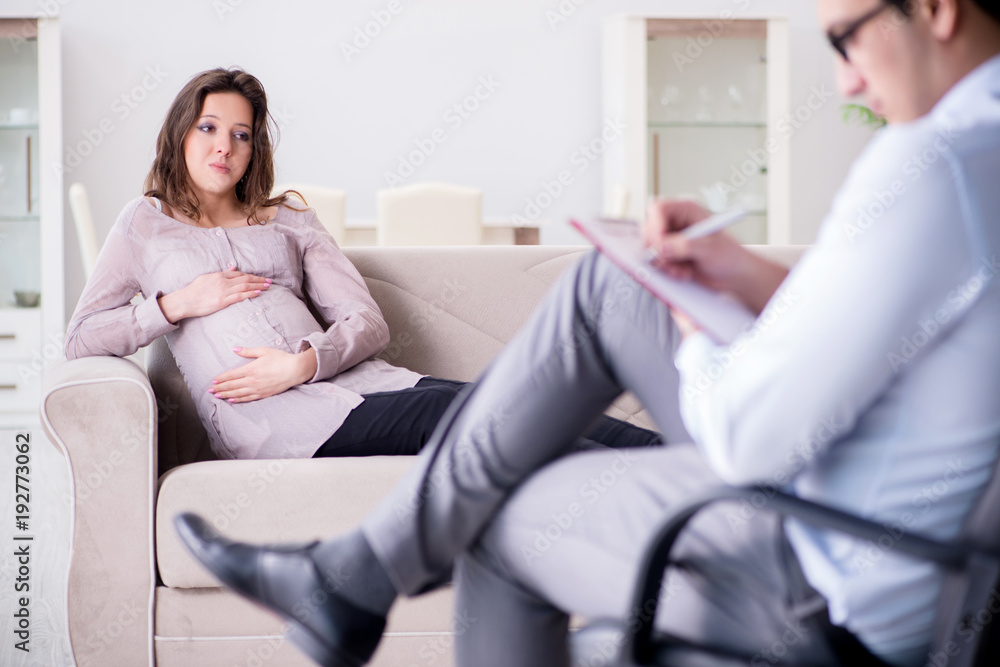 Pregnant woman visiting psychologist doctor Pregnant woman visiting psychologist doctor