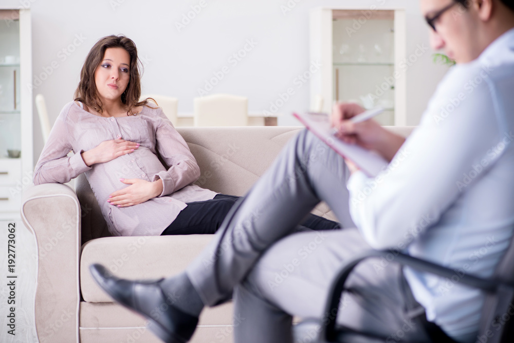 Pregnant woman visiting psychologist doctor