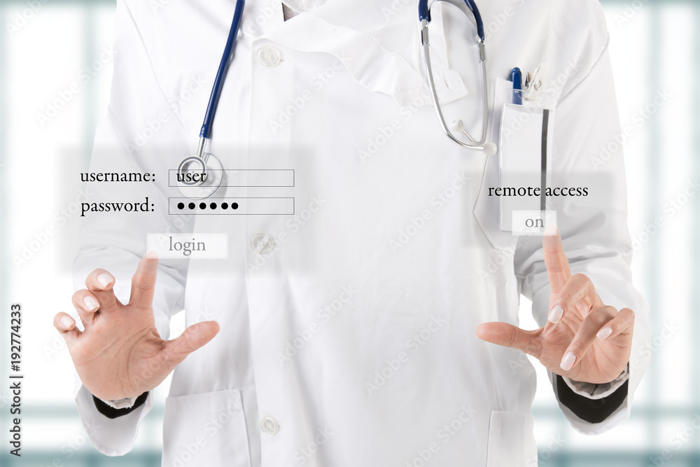 Female Doctor Logging on a Computer Female Doctor Logging on a Computer