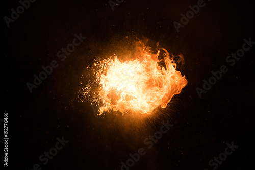 Φωτογραφία Bright flash of fire, against the black sky