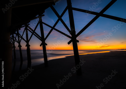 ocean pier seawall sea wall on the beach