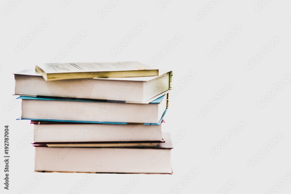 The book is arranged together for study on white background. The book is arranged together for study on white background.