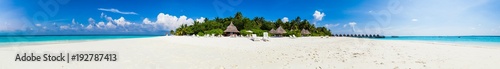 Panorama of a tropical island with white sand and palms. © ASTA Concept