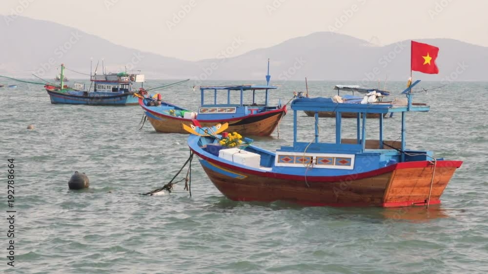 Anchored boats at Nha Trang Bay, the South China Sea Anchored boats at Nha Trang Bay, the South China Sea