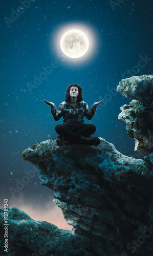 Meditates under the moon