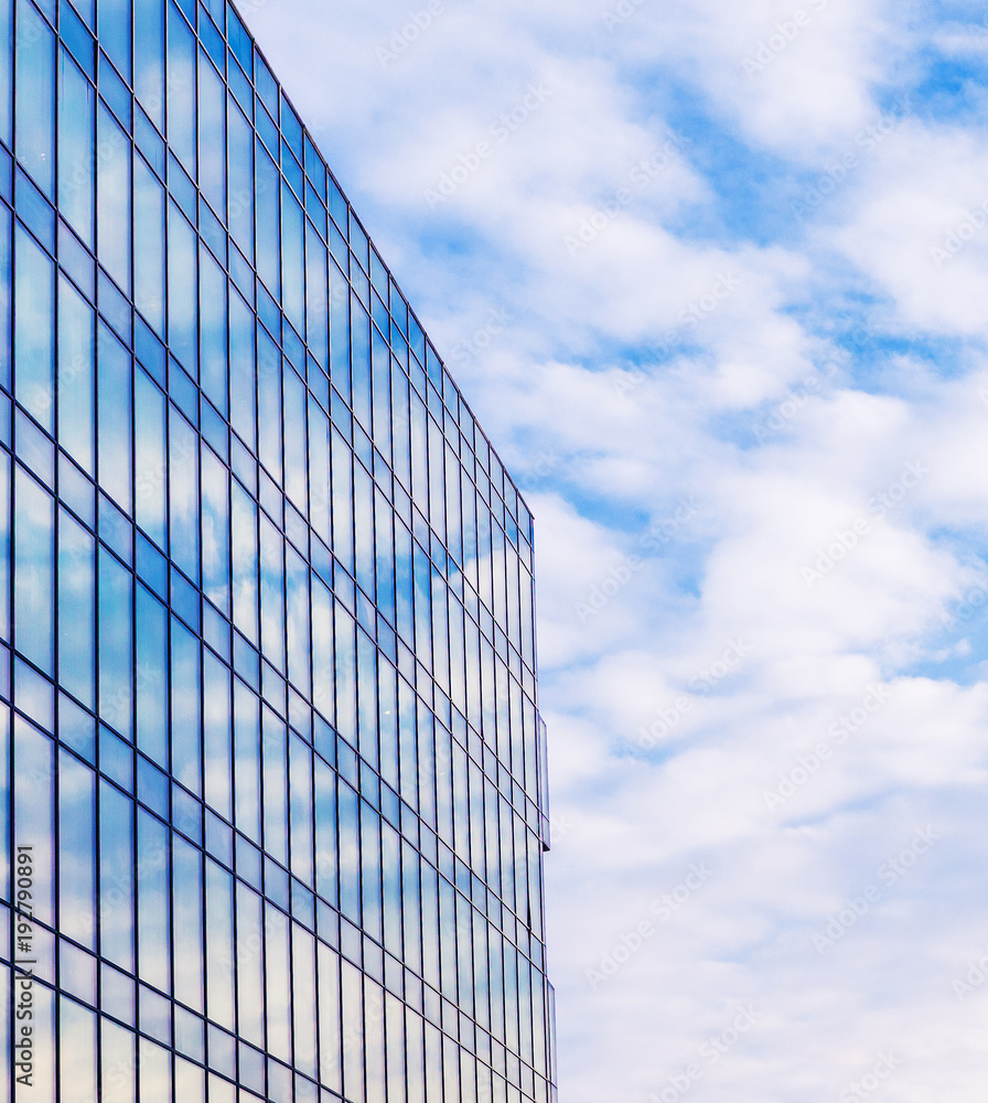 Modern building exterior with copy space. Modern office building with facade of glass.