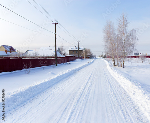 Road in the snow in the village