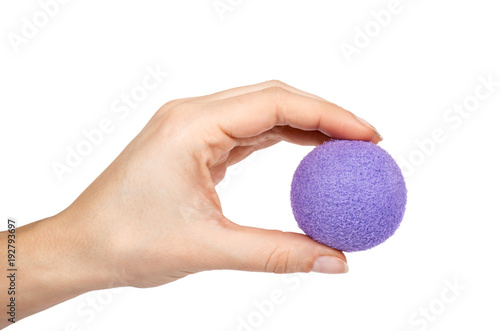 Foam rubber antistress ball, squishy relax and strength power trainer in hand. Isolated on white background