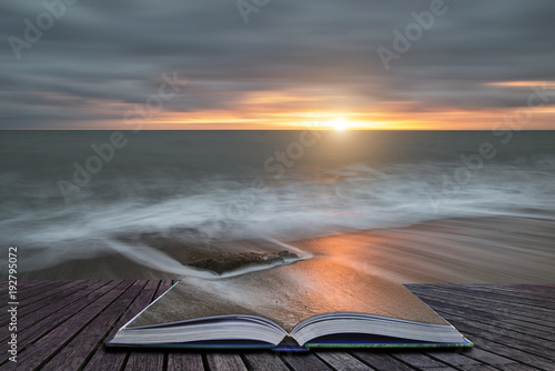 Fotografie Creative book image of Beautiful vibrant sunset landscape image of Burton Bradst