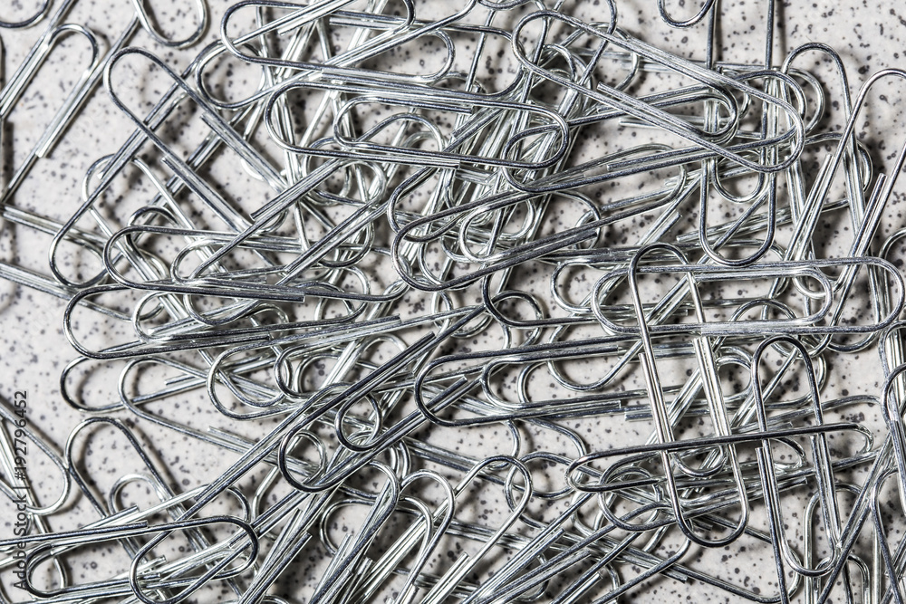 Grey metal paper clips messed up Grey metal paper clips messed up