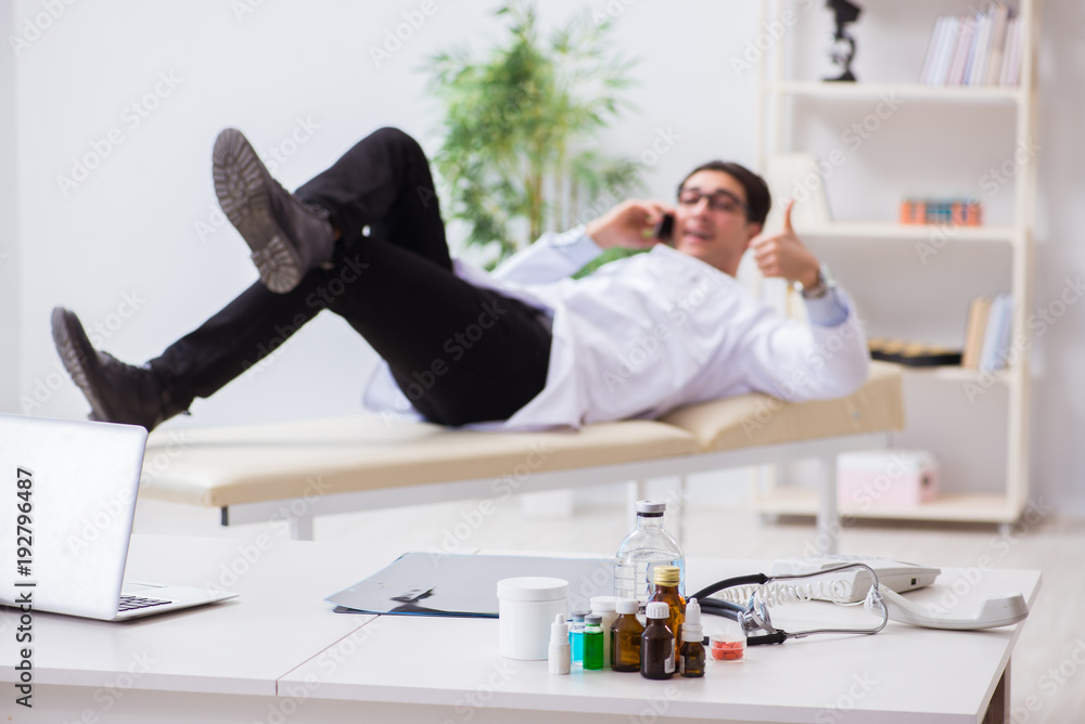 Fototapeta premium Doctor relaxing after complex surgery in hospital