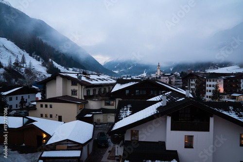 Foggy day in cozy Austrian Alps village © snowwhitehalberd