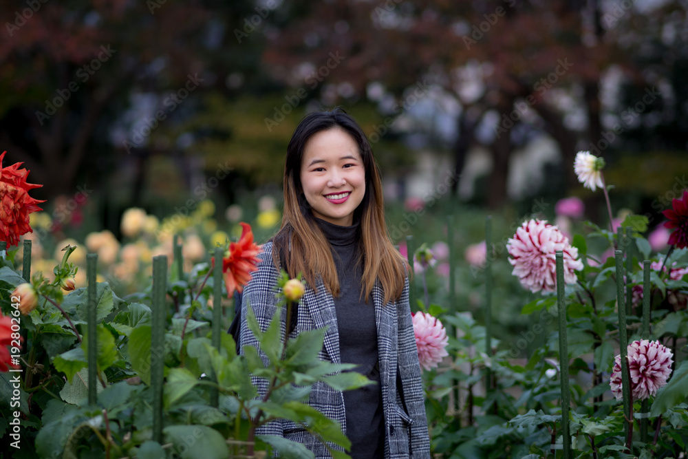 Beautiful woman posing in a japanese garden