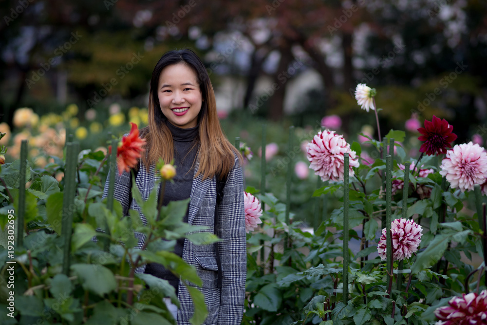Beautiful woman posing in a japanese garden Beautiful woman posing in a japanese garden