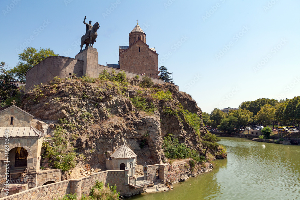 The Monument To King Vakhtang Gorgasali. The monument stands on a high rock by the river Kura next to the old Metekhi Church in downtown Tbilisi. Georgia.