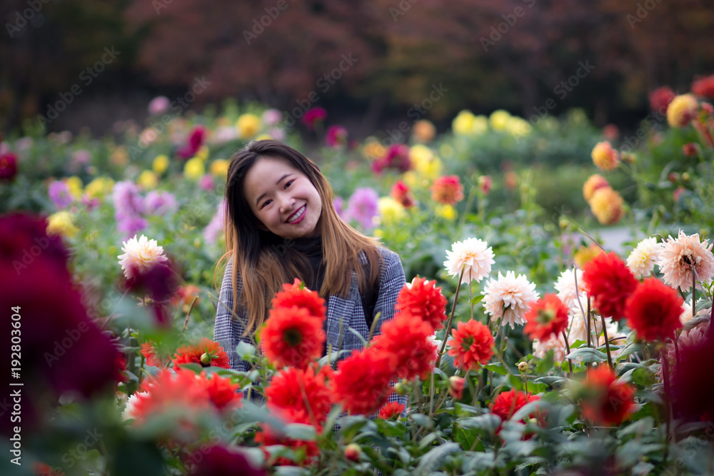 Beautiful woman posing in a Japanese garden Beautiful woman posing in a Japanese garden