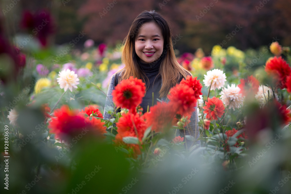 Beautiful woman posing in a Japanese garden Beautiful woman posing in a Japanese garden