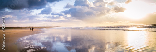 Canvas Print Walking along the beach during sunset in IJmuiden the Netherlands,