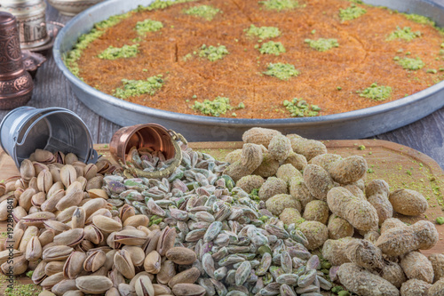 Turkish sweet kadaif with pistachio nuts photo