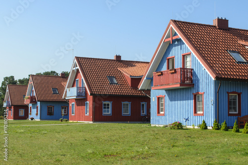 Photos Beautiful colorful wooden houses, Nida, Lithuania