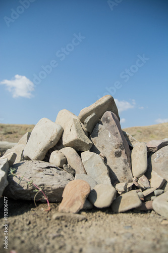
pile of stones on a beach photo