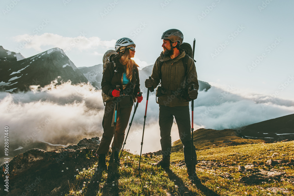 Travel Couple backpackers man and woman hiking in mountains love and adventure Lifestyle wanderlust concept. - obrazy, fototapety, plakaty 