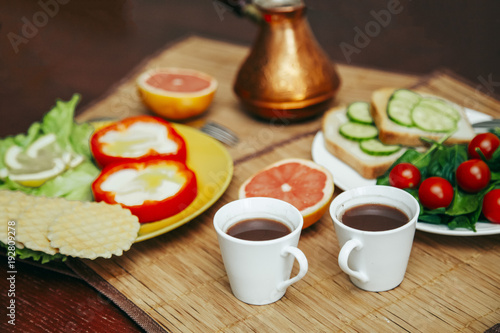 natural and healthy breakfast with toast, coffee and vegetables for vegetarian