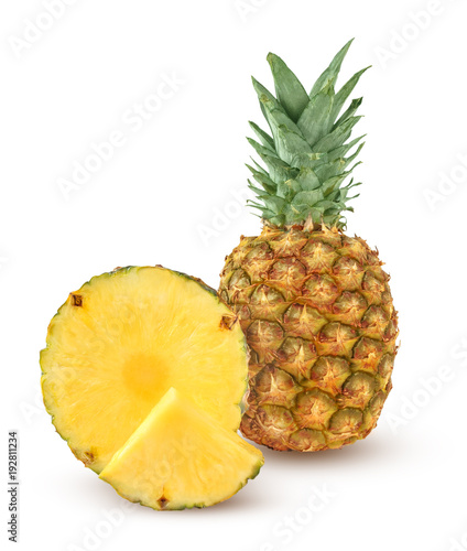 Whole and two slices of pineapple isolated on a white background