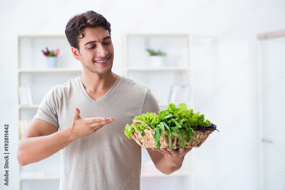 Young man in healthy eating and dieting concept Young man in healthy eating and dieting concept
