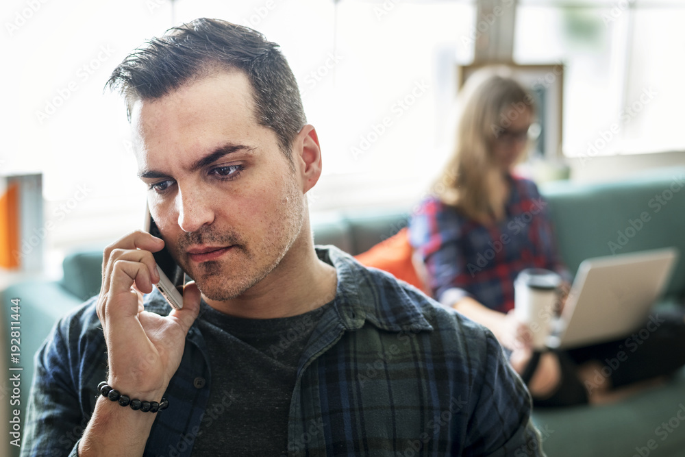 Caucasian man talking on the phone Caucasian man talking on the phone