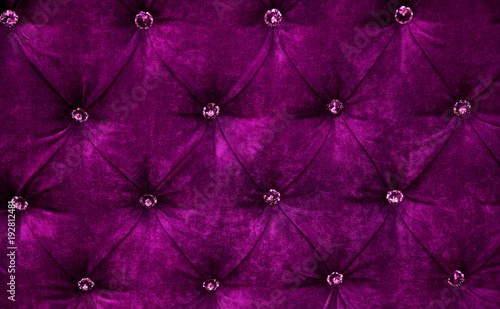 Purple diamond pattern velvet upholstery background photo