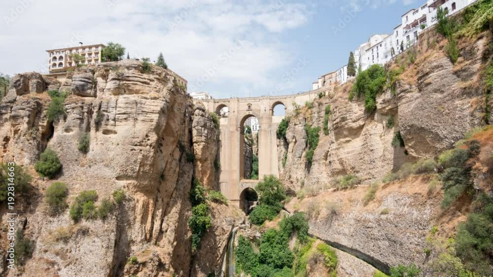 Beautiful timelapse view of Puente Nuevo bridge over Tajo Gorge in Ronda with tilt up camera motion, Andalusia, Spain Beautiful timelapse view of Puente Nuevo bridge over Tajo Gorge in Ronda with tilt up camera motion, Andalusia, Spain