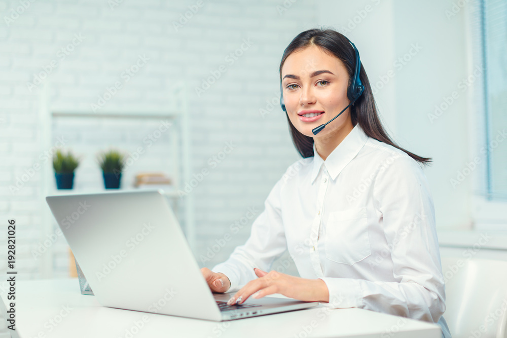 Support phone operator in headset at workplace Support phone operator in headset at workplace