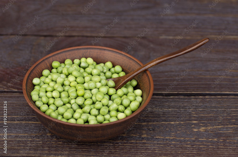 green peas on a dark background