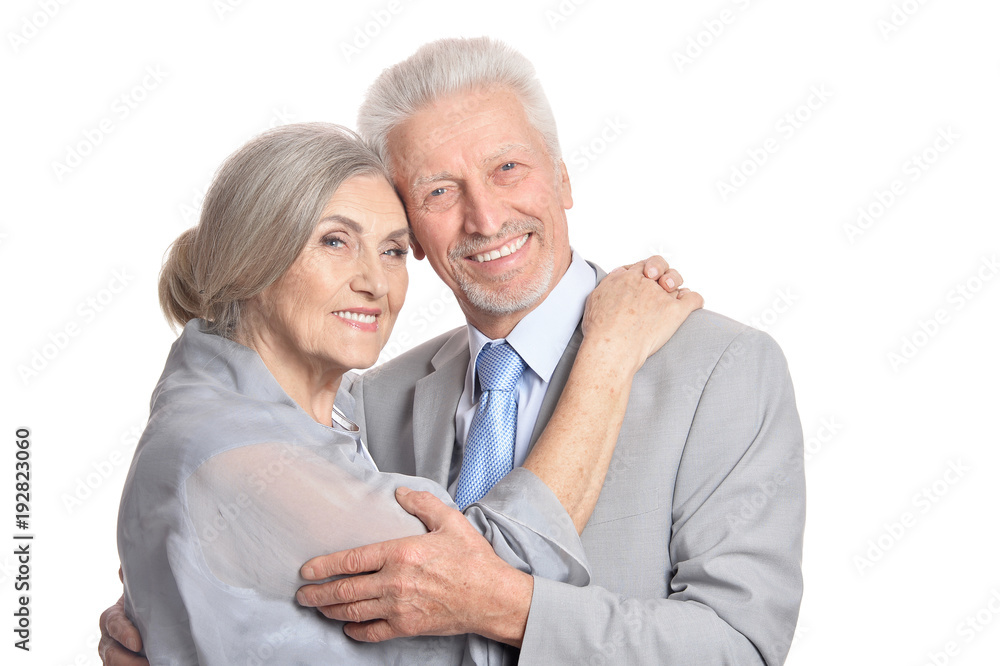 hugging senior couple on white background hugging senior couple on white background