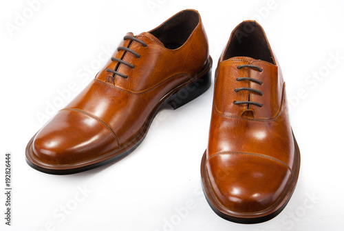 classic brown men's shoes on a white background