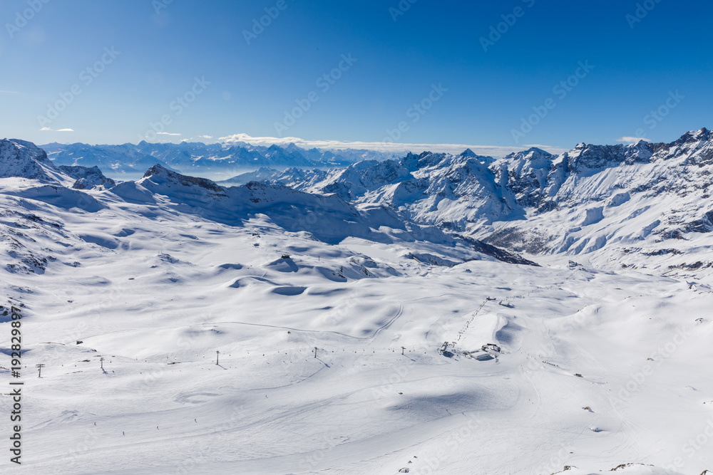 View from Furgghorn above Zermatt Switzerland towards Cervinia ski resort in Italy