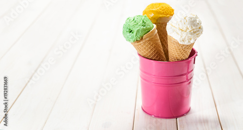 Three sorts of ice cream in waffel cones © Katecat