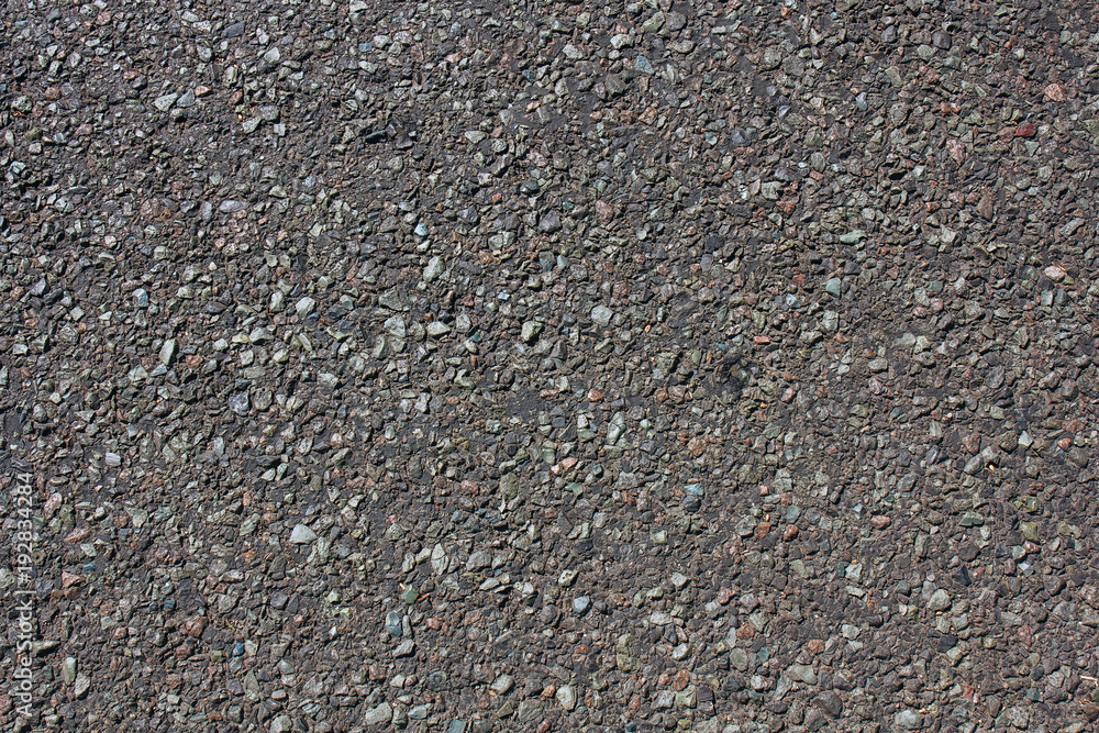 Dark urban asphalt road surface background, rough bitumen texture. Dark urban asphalt road surface background, rough bitumen texture.