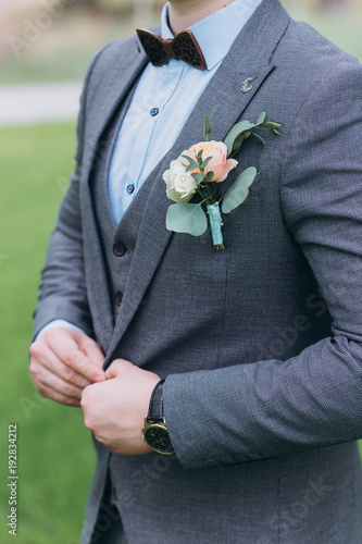 an accessory of the groom