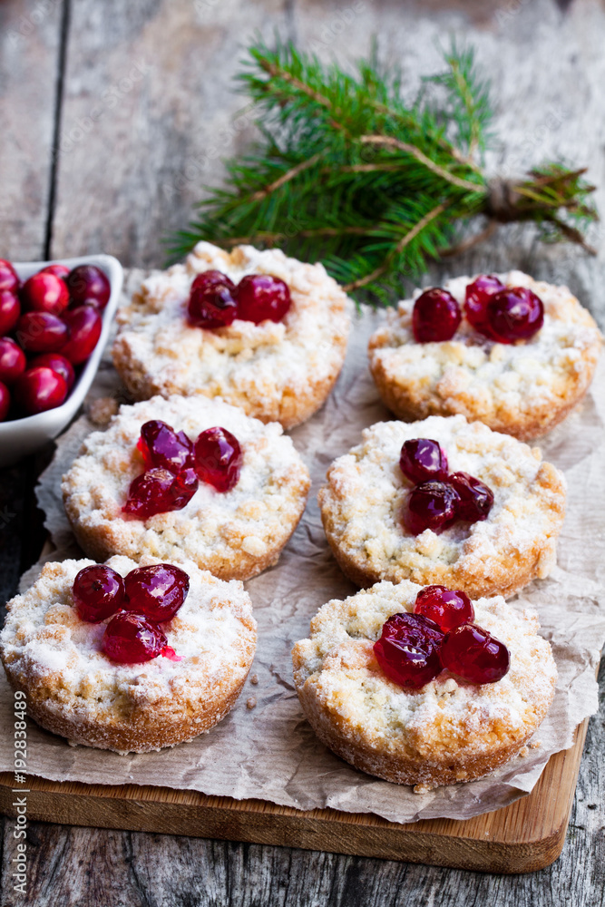 Crumble topped fruit pies on wooden table. Christmas dessert. Crumble topped fruit pies on wooden table. Christmas dessert.