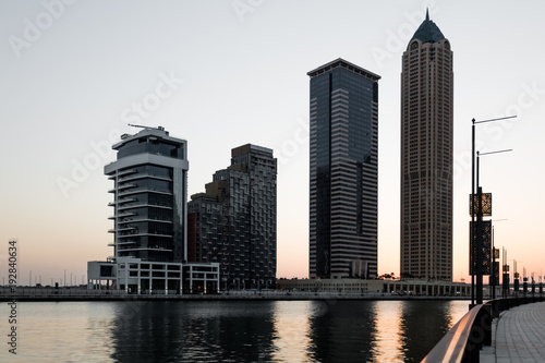 Photography Sunset over embankment of Dubai Creek, Business bay at evening