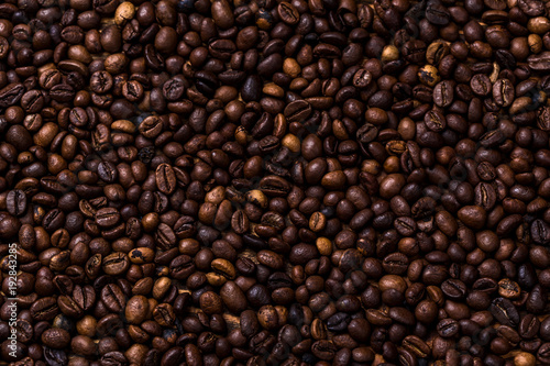 fried coffee beans. coffee beans, on a wooden background